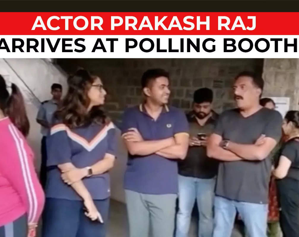
Actor Prakash Raj arrives at a polling booth in St Joseph's School in Shanti Nagar, Bengaluru to cast his vote
