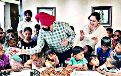 Top cop parties with slum kids on his b’day