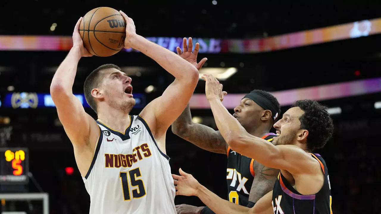 Jokic stars as Nuggets top Suns in OT; Booker out again