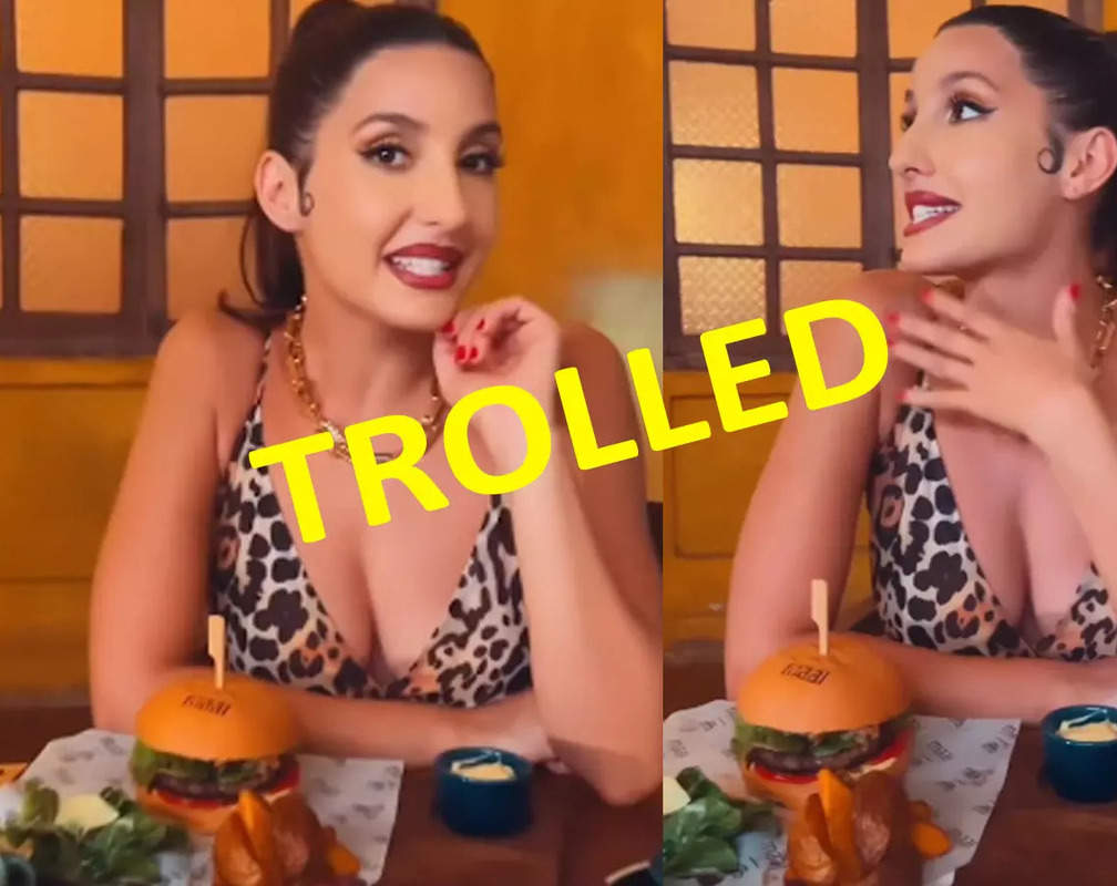 
TROLLED! Nora Fatehi enjoys lip-smacking food wearing a polka-dotted dress with deep neckline; netizens point out 'Foundation doesn't match the body'
