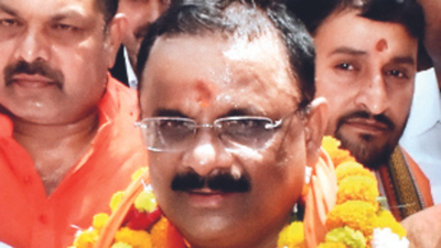 BJP's Ashok Tiwari steals a march over SP's OP Singh