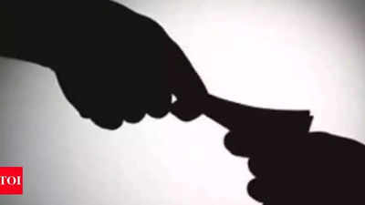 2 cops held for taking Rs 50k bribe