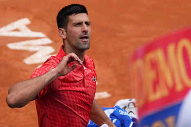 Serbia's Novak Djokovic shouts during the quarter final match against  Denmark's Holger Rune at the Italian Open tennis tournament, in Rome,  Wednesday, May 17, 2023. (AP Photo/Gregorio Borgia Stock Photo - Alamy