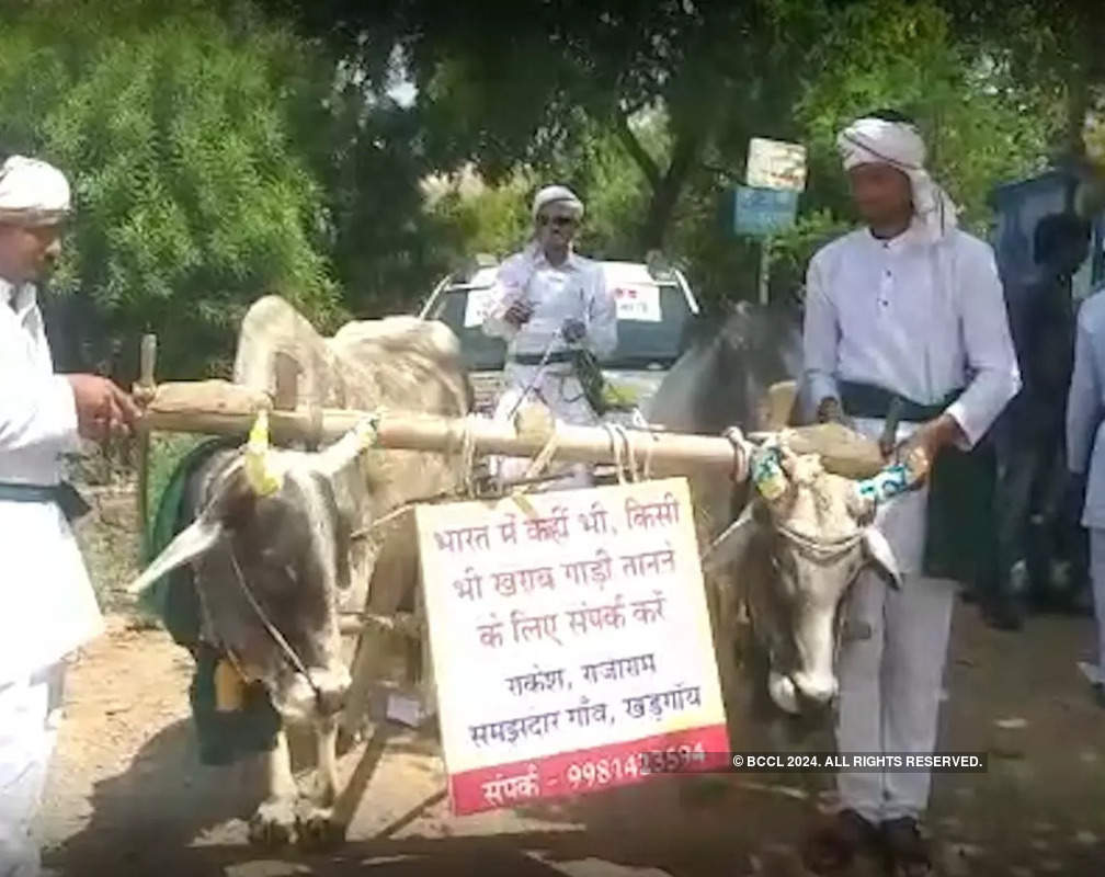
Farmer towed his luxury car with a bullock cart and send back to company
