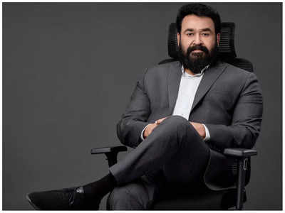 Mohanlal rocks a stylish black suit with an executive flair, the ace actor oozes timeless charm
