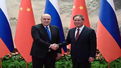 On Beijing visit, Russian PM Mishustin says pressure from West is strengthening ties with China