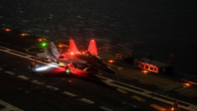 MiG-29K fighter conducts night landing on indigenous aircraft carrier