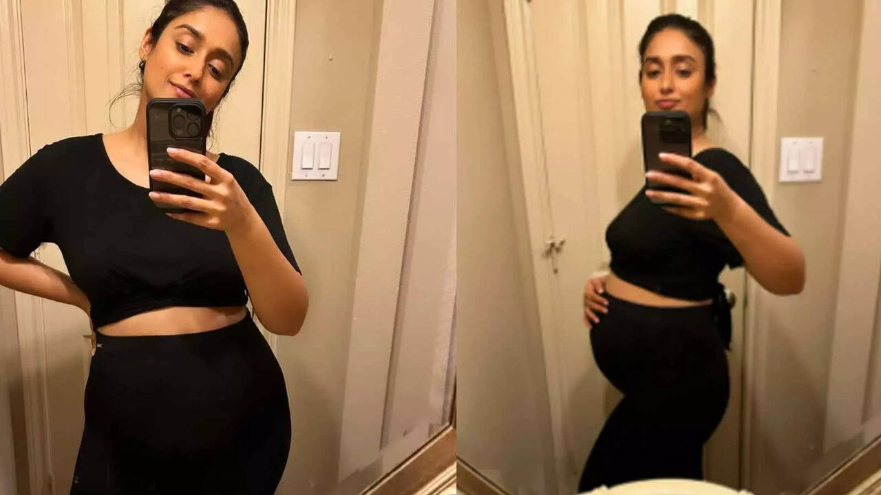 Mom-to-be Ileana DCruz shares mirror selfies flaunting her baby bump.  CHECK OUT