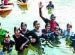
11 girls swim across Periyar with hands tied
