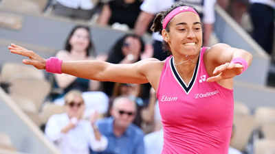 Caroline Garcia battles into French Open second round