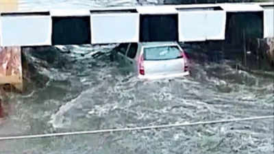 Underpasses under water in Bengaluru: Man toils to retrieve bike, women escape unharmed