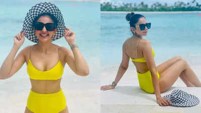 Rakul Preet Singh looks gorgeous in a yellow bikini as she holidays in Maldives - Pics inside