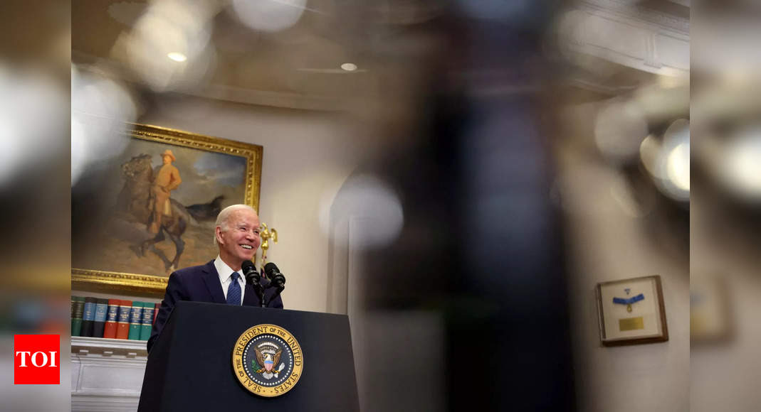 Biden: President Biden signs debt ceiling bill that pulls US back from brink of unprecedented default – Times of India