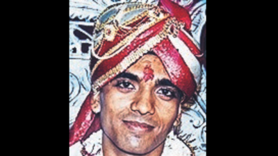 Man held 20 years after killing bizman, kept changing identity