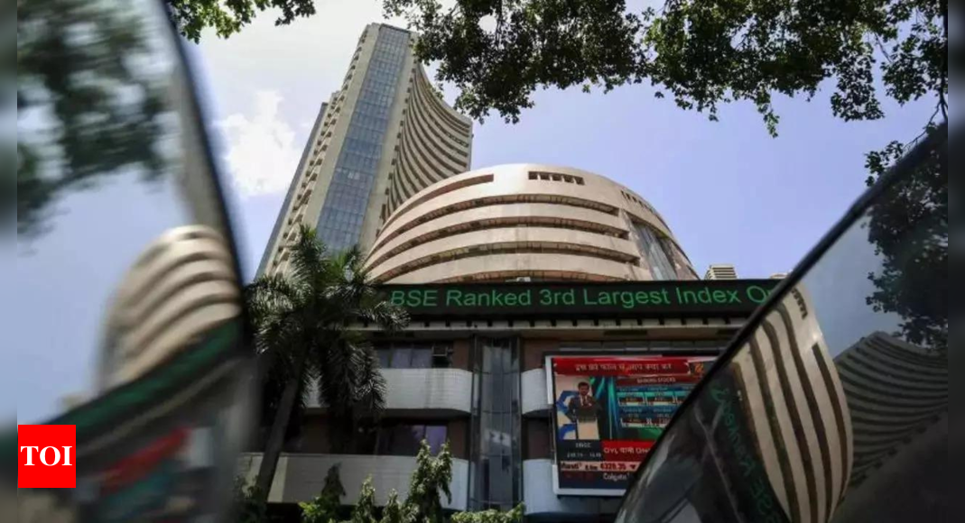 Equity markets settle flat in volatile trade; IT stocks play spoilsport – Times of India