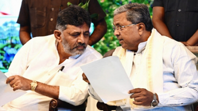 Opposition attacks Karnataka govt over riders in Rs 2,000/month plan