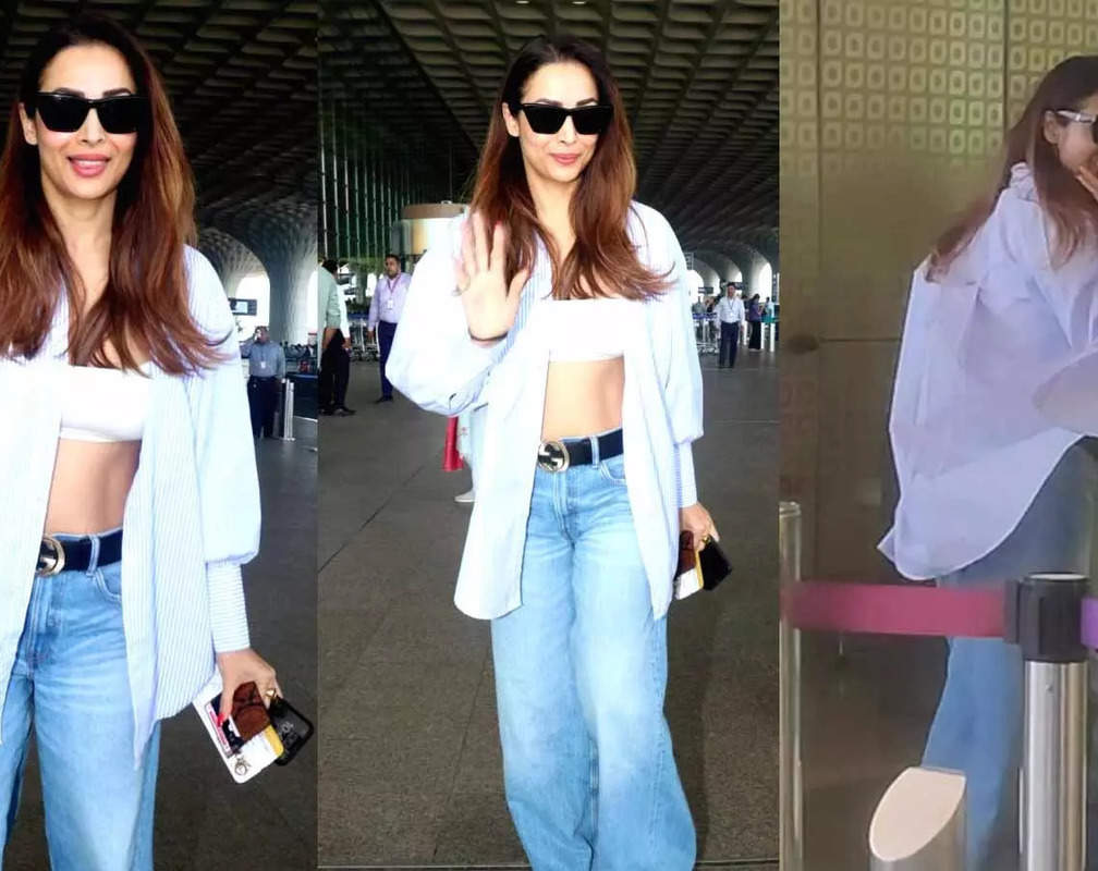 
49-year-old Malaika Arora takes summer fashion to the next level, gets spotted at the airport flaunting her abs
