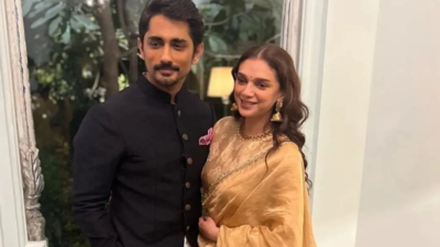 Siddharth and Aditi Rao Hydari pose adorably in an unseen picture from Sharwanand's wedding