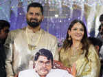 Abishek Ambareesh and Aviva Bidapa with a lifesize cutout of the late Ambareesh