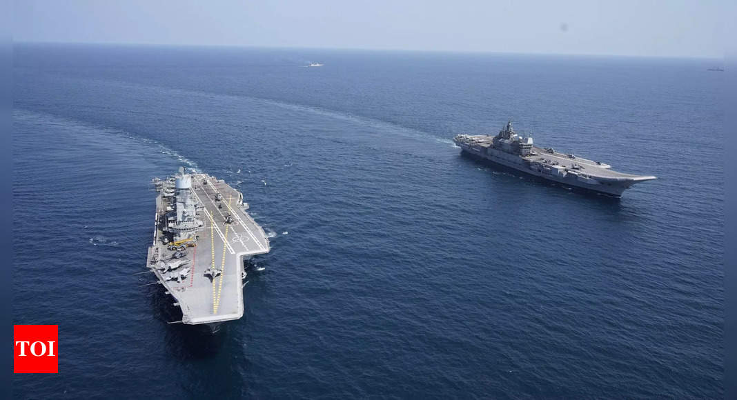 In strategic signalling to China, India exercises two carrier battle groups together | India News – Times of India