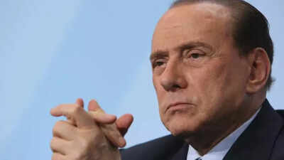 Russia's Putin pays tribute to Berlusconi as 'dear', wise friend