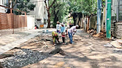 Bengaluru: Upset over poor civic response, residents take up road repair