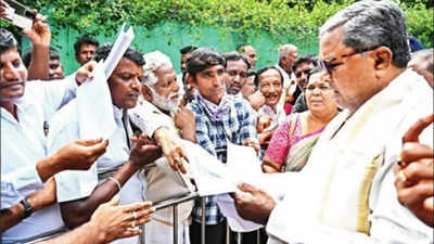 Implement Ayushman BharatArogya Karnataka health insurance: CM Siddaramaiah