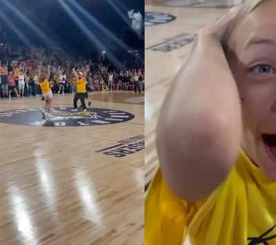 Woman wins free beer for a year for hitting a half-court shot