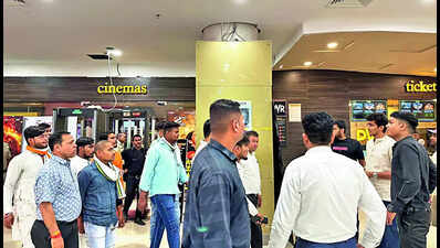 NSUI & Hindu outfits protest, remove film poster from theatre