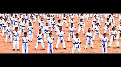 Practising karate helps to stay physically fit: SP