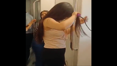 Watch: Video of girl straightening her hair inside Delhi metro goes viral