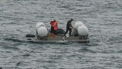 In race against clock, expanding fleet of ships searches for submersible lost near Titanic wreck