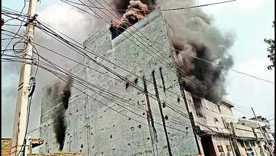 Trapped in ‘illegal’ factory on fire, workers jump, use make-do rope