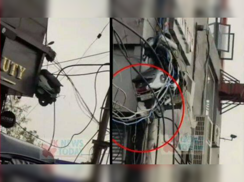 Video of scooter stuck in electric wires goes viral; netizens react