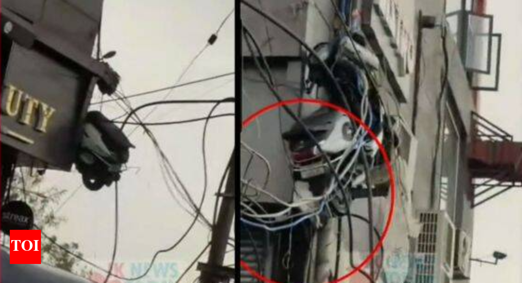 Video of scooter stuck in electric wires goes viral; netizens react