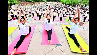 Tricity twists & turns, Purohit says yoga holds the key to better health