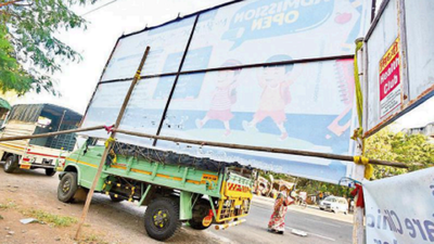Illegal posters removed near Satara Road, cases filed