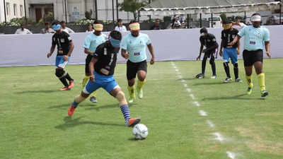 Visually impaired teams showcase their football skills in an exciting match