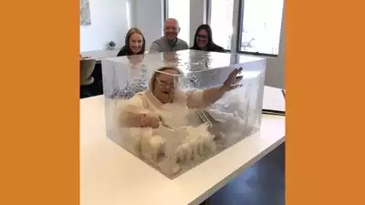 The truth behind the viral pic of a grandma encased in a resin table!