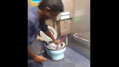 Conservancy workers in Madurai clean rail coach toilets barehanded