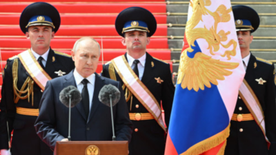 Putin says Russia dodged civil war, prepares to disarm Wagner