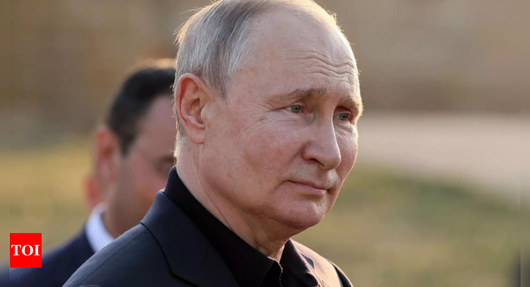 Putin seeks to project strong image as military questions linger – Times of India