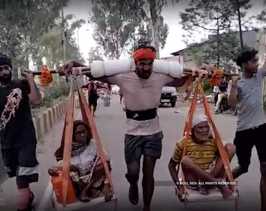 
Kanwar Yatra: Modern Shravan Kumar carries his grandparents in Kanwar for pilgrimage
