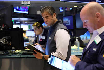 US stocks: Wall Street ends slightly higher, Tesla jumps