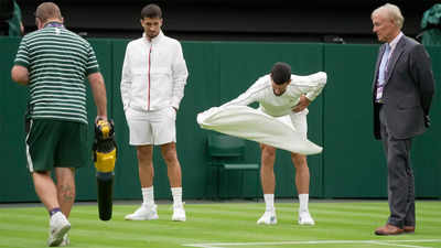 Wimbledon chiefs play down fears over damp grass on Centre Court