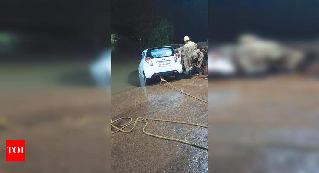 2 escape unhurt as car goes off ramp into river | Goa News - Times of India