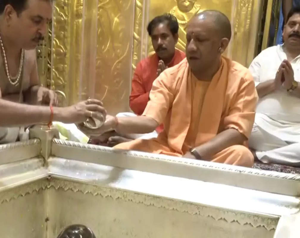
UP CM Yogi offers prayers at Kashi Vishwanath Temple in Varanasi on first day of ‘Shravan’
