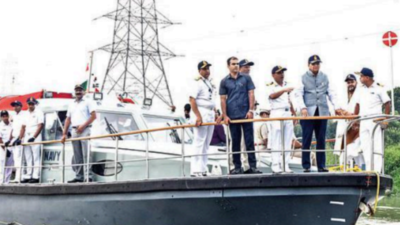 On Navy boat, LG checks Yamuna cleanup