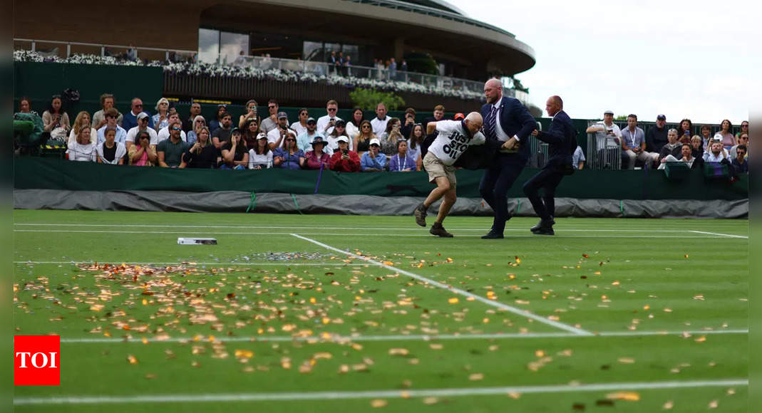 Watch: Just Stop Oil protesters disrupt play at Wimbledon | Tennis News – Times of India