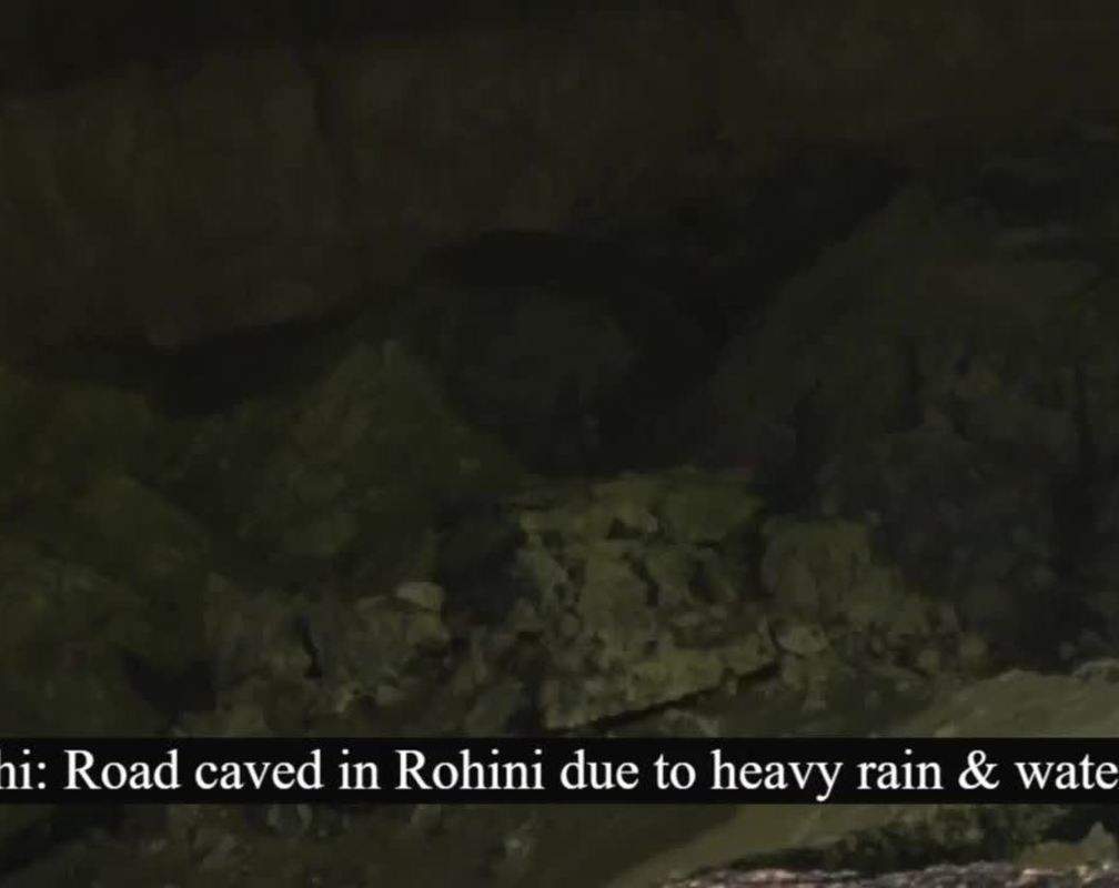 
Delhi: Road caved in Rohini due to heavy rain & waterlogging
